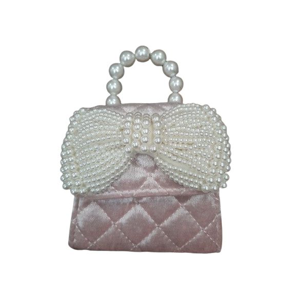 QUILTED VELVET PURSE WITH PEARL BOW