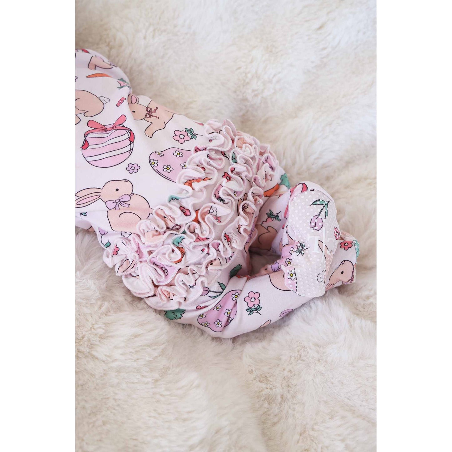 Hoppy Spring Ruffle Zipper Footie | Pink